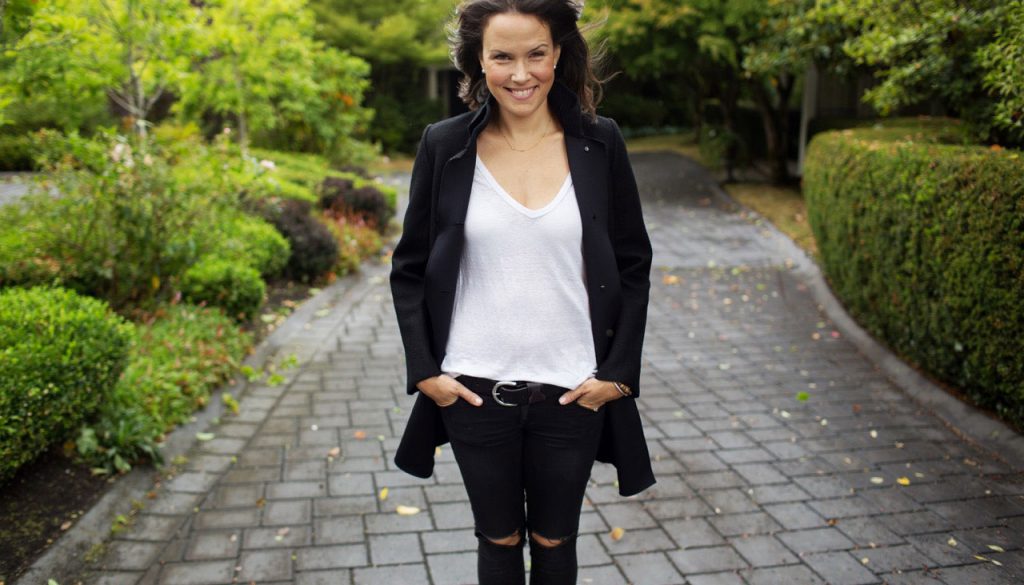 Jessie Carlson wardrobe stylist smiling at camera